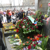 Flowers are laid at the April 9 memorial in front of Parliament on Rustaveli Avenue in Tbilisi